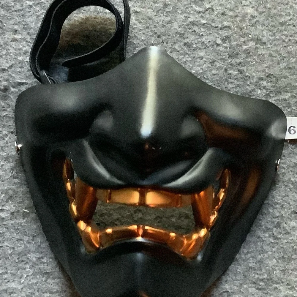 Black and Gold Mask with adjustable strap